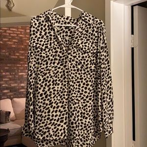 A cheetah print blouse